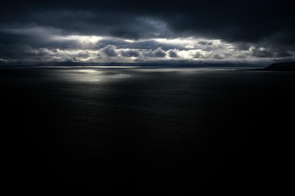 Clouds over the Arctic Ocean near the Svalbard archipelago. - Sputnik Africa