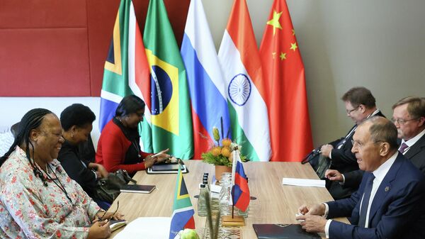 In this handout photo released by the Russian Foreign Ministry, Russian Foreign Minister Sergey Lavrov, right, and his South African counterpart Naledi Pandor attend a meeting on the sidelines of the15th BRICS Summit in Johannesburg, South Africa. Editorial use only, no archive, no commercial use. - Sputnik Africa