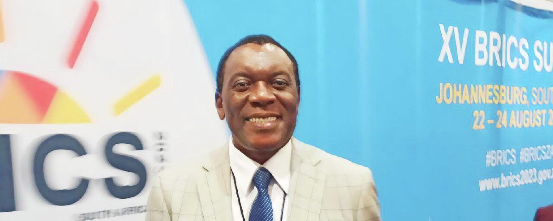 Dr. Siyabonga Cyprian Cwele, South Africa's Ambassador to China and former Minister of Home Affairs, poses for a photo on the last day of the 15th BRICS summit, held in Johannesburg, South Africa, on August 22-24.  - Sputnik Africa, 1920, 24.08.2023