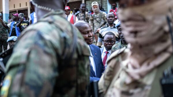 Central African Republic President Faustin Archange Touadera (C) leaves after voting at the Boganda high school in Bangui, on July 30, 2023. - Sputnik Africa
