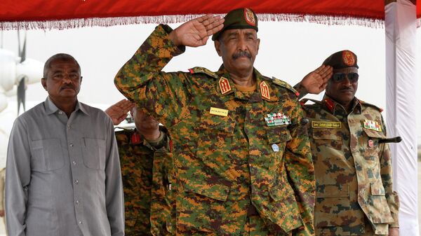 Sudan's Army chief Abdel Fattah al-Burhan arrives to the coastal city of Port Sudan in late August, 2023. - Sputnik Africa
