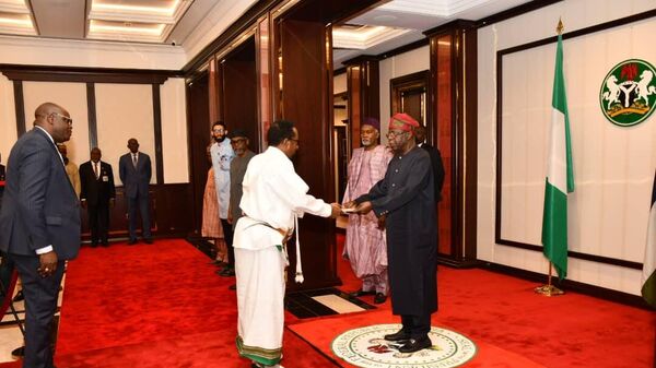 Ethiopian Ambassador to Nigeria, Awwal Wagris Mohammed, presents his Letter of Credence to Nigerian President, Bola Ahmed Tinubu, at the State House, Abuja, Nigeria, on Tuesday, August 29, 2023. - Sputnik Africa