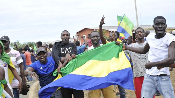 Gabonese celebrate on the streets in Libreville after the announcement of the overthrow of the Bongo government - Sputnik Africa