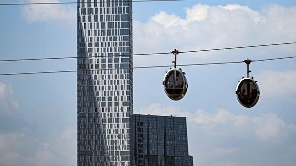 People ride the cable cars in Moscow, Russia. - Sputnik Africa