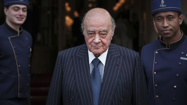 Egyptian businessman and Ritz hotel owner Mohamed Al Fayed poses with his hotel staff in Paris, June 27, 2016. Al Fayed, the former Harrods owner whose son Dodi was killed in a car crash with Princess Diana, has died at age 94. His death was announced Friday, Sept. 1, 2023, by Fulham Football Club, which Al Fayed once owned.  - Sputnik Africa