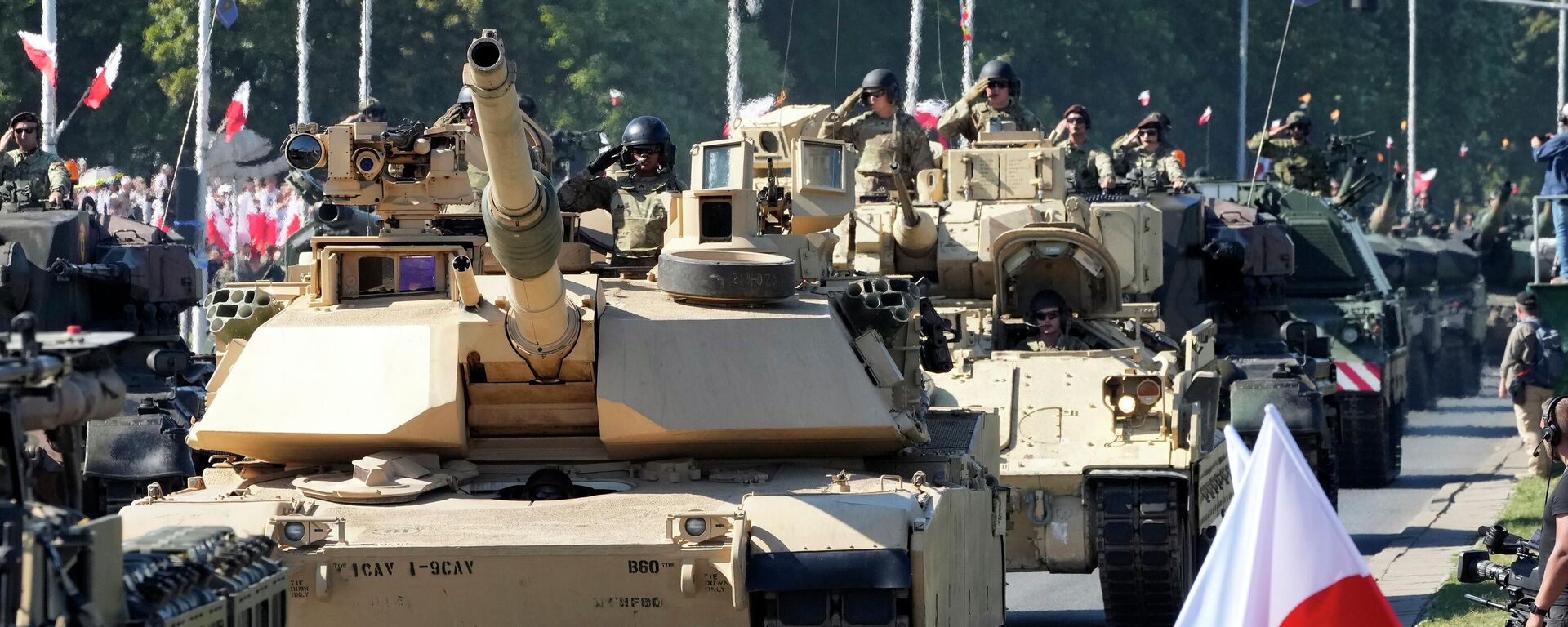 US-made Abrams tanks purchased by Poland take part in a massive military parade to celebrate the Polish Army Day in Warsaw. August 15, 2023. - Sputnik Africa, 1920, 02.09.2023
