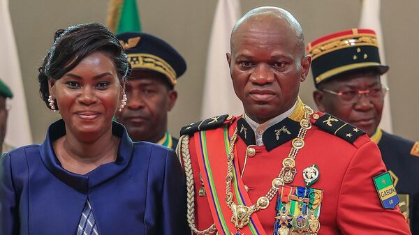 Interim president of Gabon, General Brice Oligui Nguema, and his wife - Sputnik Africa