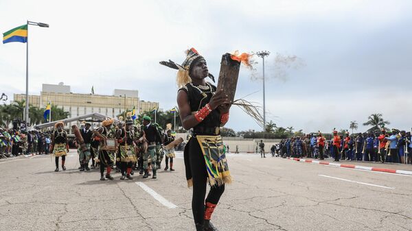 Pygmy representatives at a parade in honor of the interim president of Gabon, General Brice Oligui Nguema - Sputnik Africa