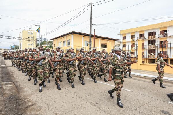 Members of the military take part in the military parade in honour of General Brice Oligui Nguema who was inaugurated as Gabon&#x27;s &#x27;interim president&#x27;, in Libreville on September 4. - Sputnik Africa