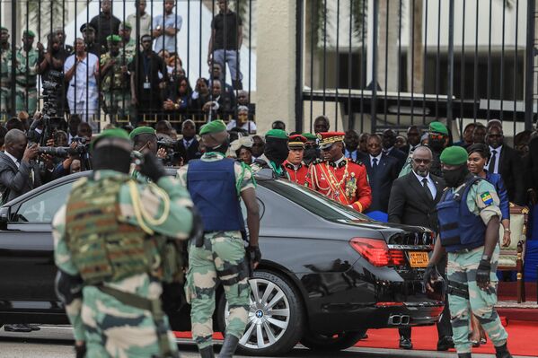 General Brice Oligui Nguema, who was inaugurated as Gabon&#x27;s &#x27;interim president&#x27;, leaves at the end of the military parade, in Libreville on September 4. - Sputnik Africa