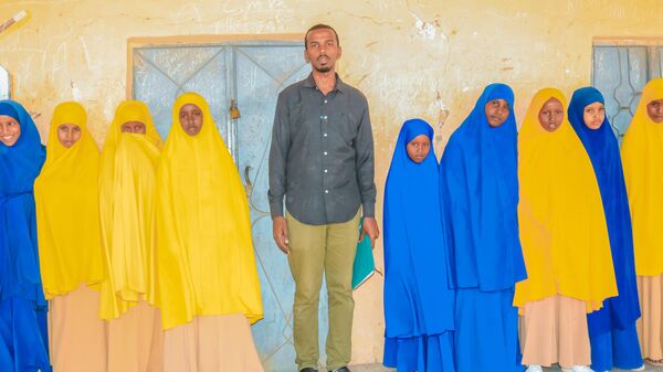 Somalian teacher Mohamud Hussein - Sputnik Africa