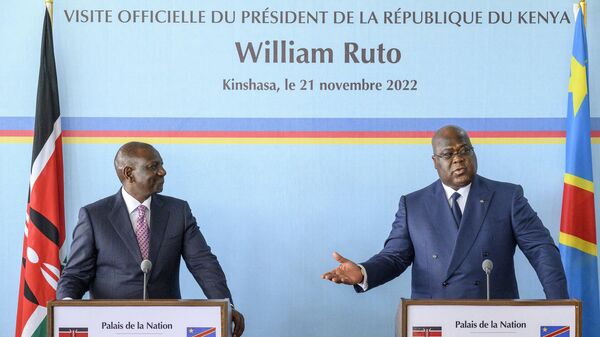 Kenyan President William Ruto (L) reacts during a joint press conference with the President of Democratic Republic of Congo Felix Tshisekedi (R) at the Palace of the Nation in Kinshasa on November 21, 2022. His visit comes on the heels of a trip by Ruto's predecessor Uhuru Kenyatta, who is mediating in the DR Congo crisis on behalf of the regional East African Community bloc. - Sputnik Africa