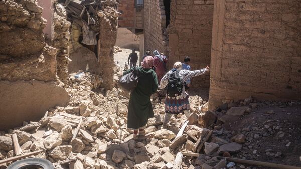 Жители которой покидают свои дома после землетрясения, Марокко - Sputnik Afrique