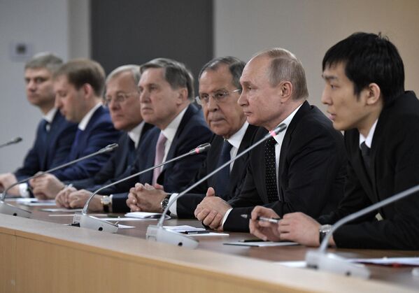 Russian president during the Russian-Korean talks on April 25, 2019 in a broad format with Kim Jong Un at the campus of the FEFU  on Russky Island. - Sputnik Africa