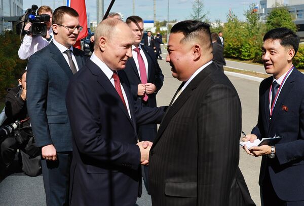 Russian President Vladimir Putin and North Korean leader Kim Jong Un at the Vostochny Spaceport. - Sputnik Africa