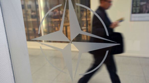 Emblem of the organization at NATO headquarters in Brussels, Belgium - Sputnik Africa