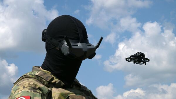 A Russian serviceman operates an UAV in the special operation zone in Ukraine. File photo - Sputnik Africa