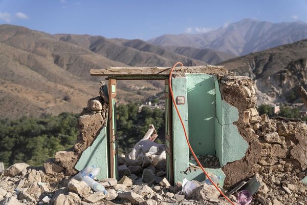 The door of what used to be a home stands amidst rubble which was caused by the earthquake, in the town of Imi N&#x27;tala, outside Marrakech, Morocco, Wednesday, Sept. 13.  - Sputnik Africa