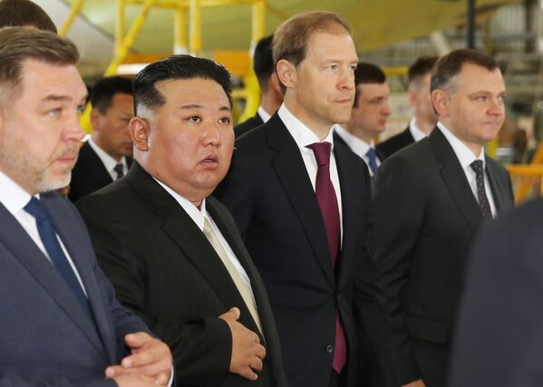 Chairman Kim, accompanied by Minister Manturov, enjoys awe-inspiring aircraft at the aviation plant. - Sputnik Africa