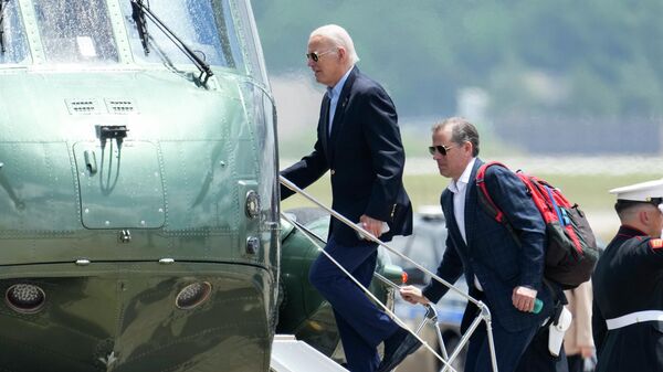 President Joe Biden boards Marine One with his son Hunter Biden as he leaves Andrews Air Force Base, Md., on his way to Camp David, Saturday, June 24, 2023 - Sputnik Africa