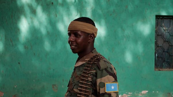 A member of the armed security for the mayor of Baidoa poses for a portrait in Baidoa, Somalia, on November 9, 2022. - Sputnik Africa