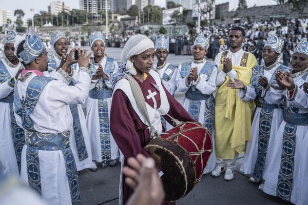Members of an Orthodox choir sing during the celebrations of the Ethiopian Orthodox holiday of Meskel. - Sputnik Africa