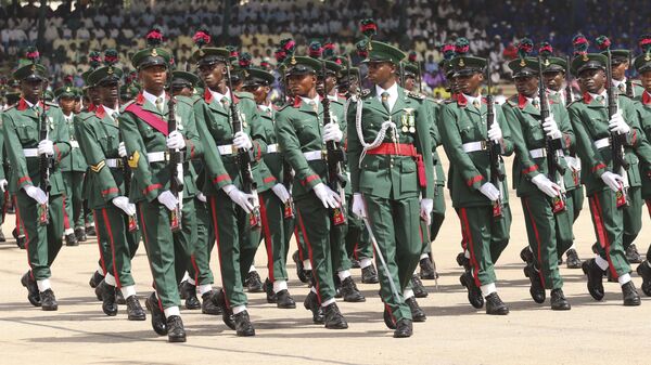 Nigerian soldiers march during 62nd anniversary celebrations of Nigerian independence, in Abuja, Nigeria, Oct. 1, 2022. - Sputnik Africa