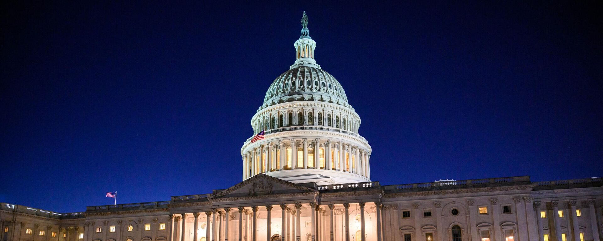 The US Capitol is seen at dusk as the House meets to vote on a rules package for the 118th Congress, in Washington, DC, on January 9, 2023.  - Sputnik Africa, 1920, 02.10.2023