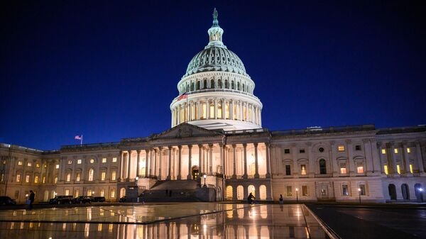 The US Capitol is seen at dusk as the House meets to vote on a rules package for the 118th Congress, in Washington, DC, on January 9, 2023.  - Sputnik Africa
