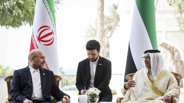  Iranian Parliament Speaker Mohammad Bagher Qalibaf, left, listens to UAE Vice President, Deputy Prime Minister and Chairman of the Presidential Court Sheikh Mansour bin Zayed Al Nahyan during their meeting, in Abu Dhabi, United Arab Emirates, Thursday, Oct. 5, 2023. - Sputnik Africa