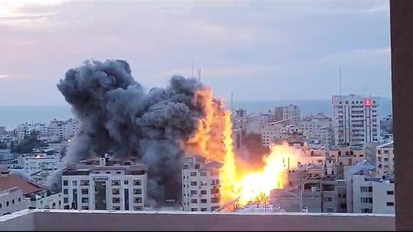 Обстрел зданий в палестинском городе Газа - Sputnik Africa