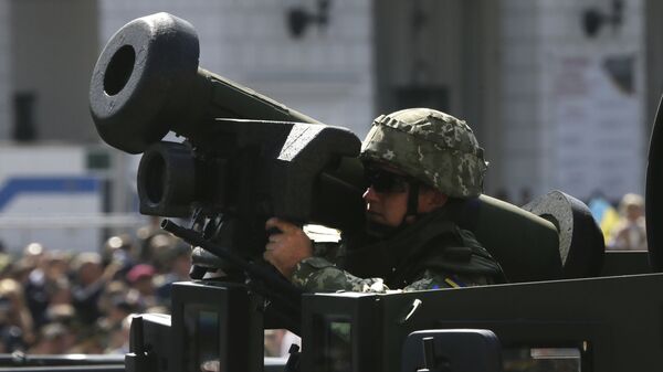 Ukrainian soldier armed with US Javelin ride along Khreshchatyk Street, during a military parade to celebrate Independence Day in Kiev, Ukraine. File photo - Sputnik Africa