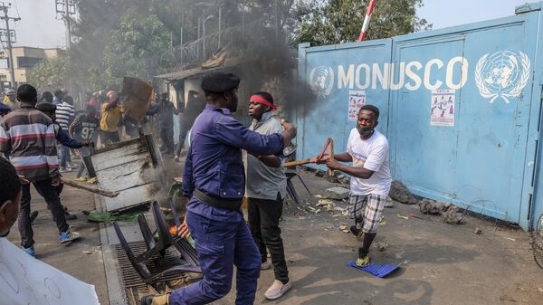 Residents protest against the United Nations peacekeeping force (MONUSCO) deployed in the Democratic Republic of the Congo, in Goma, Monday, July 25, 2022 - Sputnik Africa