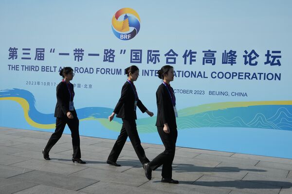 Workers prepare for the Third Belt and Road Forum held at the China National Convention Center in Beijing. - Sputnik Africa
