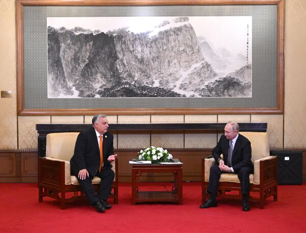 Russian President Vladimir Putin and Hungarian Prime Minister Viktor Orban during a meeting in Beijing. - Sputnik Africa