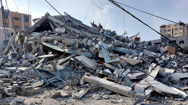 Décombres des bâtiments détruits à la suite des frappes de missiles israéliens sur Gaza.  - Sputnik Afrique