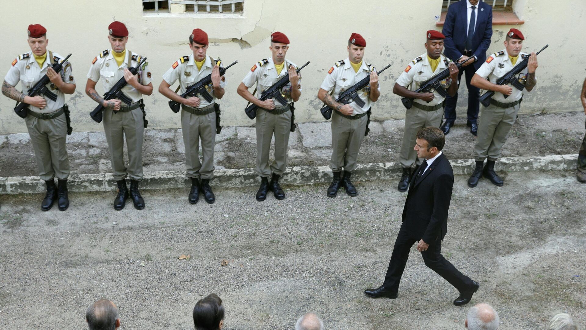 French President Emmanuel Macron reviews troops before a ceremony in tribute to late French resistant Fred Scamaroni at Ajaccio's citadelle during a three-day trip in Corsica on September 28, 2023. - Sputnik Africa, 1920, 20.10.2023