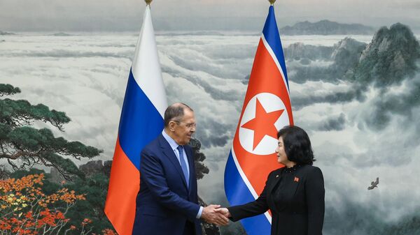 Russian Foreign Minister Sergei Lavrov and his North Korean counterpart Coe Son-hui during Lavrov's two-day visit to Pyongyang, October 19, 2023. - Sputnik Africa