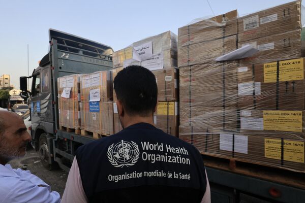 Medical aid from the World Health Organization arrives at the Nasser hospital in Khan Yunis in the southern Gaza Strip on October 23, 2023. - Sputnik Africa