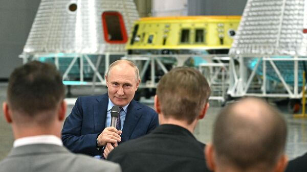 October 26, 2023. Russian President Vladimir Putin communicates with young scientists during a visit to PJSC RSC Energia [Energy] named after S.P. Korolev. - Sputnik Africa