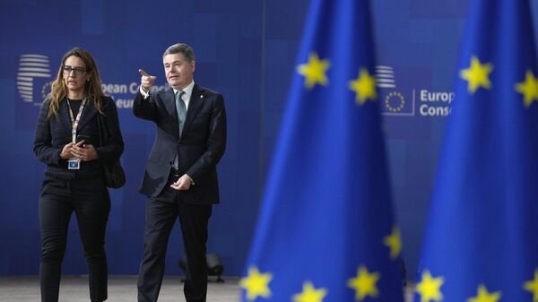 President of the Eurogroup Paschal Donohoe, right, arrives for an EU summit at the European Council building in Brussels, Friday, Oct. 27, 2023.  - Sputnik Africa