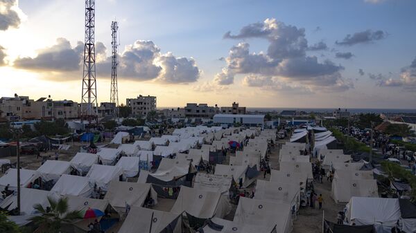 A UNDP-provided tent camp for Palestinians displaced by the Israeli bombardment of the Gaza Strip is seen in Khan Younis on Thursday, Oct. 19, 2023. - Sputnik Africa