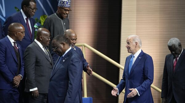 President Joe Biden and African leaders arrive for a family photo during the U.S.-Africa Leaders Summit at the Walter E. Washington Convention Center in Washington, Thursday, Dec. 15, 2022. - Sputnik Africa