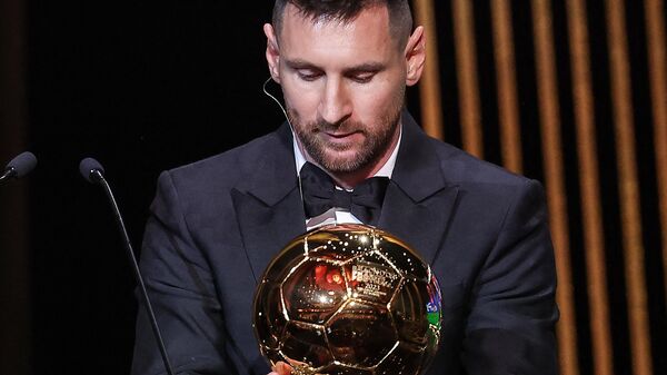Inter Miami CF's Argentine forward Lionel Messi reacts on stage as he receives his 8th Ballon d'Or award during the 2023 Ballon d'Or France Football award ceremony at the Theatre du Chatelet in Paris on October 30, 2023. - Sputnik Africa