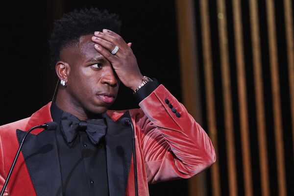 Real Madrid&#x27;s Brazilian forward Vinicius Junior gestures as he receives the Socrates Trophy for most involved player in societal and charitable projects during the 2023 Ballon d&#x27;Or France Football award ceremony at the Theatre du Chatelet in Paris on October 30, 2023. - Sputnik Africa