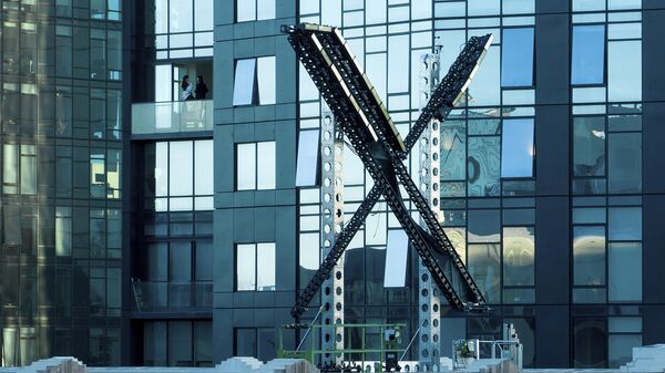 A partially completed X sign rests atop the company headquarters, formerly known as Twitter, in downtown San Francisco, on Friday, July 28, 2023.  - Sputnik Africa