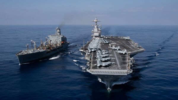 The world's largest aircraft carrier USS Gerald R. Ford (CVN) 78 and the USNS Laramie (T-AO-203) conduct a refueling-at-sea in the Eastern Mediterranean Sea, Oct. 11, 2023. - Sputnik Africa