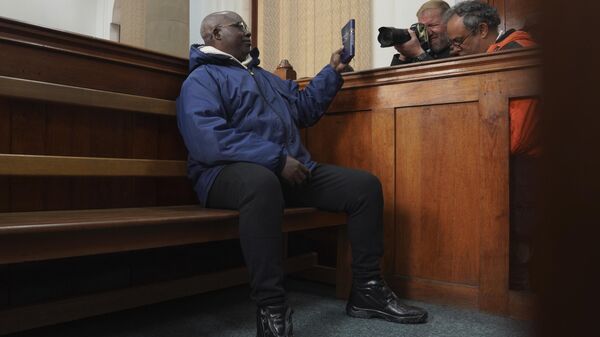 Fulgence Kayishema sits on the bench in the Magistrate's Court in Cape Town, South Africa - Sputnik Africa