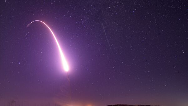 This image taken with a slow shutter speed on Oct. 2, 2019, and provided by the U.S. Air Force shows an unarmed Minuteman 3 intercontinental ballistic missile test launch at Vandenberg Air Force Base, Calif. The Pentagon has raised to $95.8 billion the estimated cost of fielding a new fleet of land-based nuclear missiles to replace the Minuteman 3 - Sputnik Africa