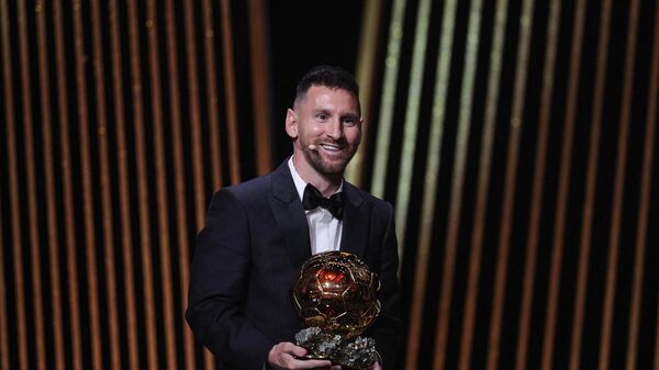 Inter Miami CF's Argentine forward Lionel Messi reacts on stage with his trophy as he receives his 8th Ballon d'Or award during the 2023 Ballon d'Or France Football award ceremony at the Theatre du Chatelet in Paris on October 30, 2023 - Sputnik Africa